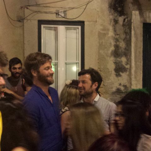 Friends laughing during St. Anthony in Lisbon