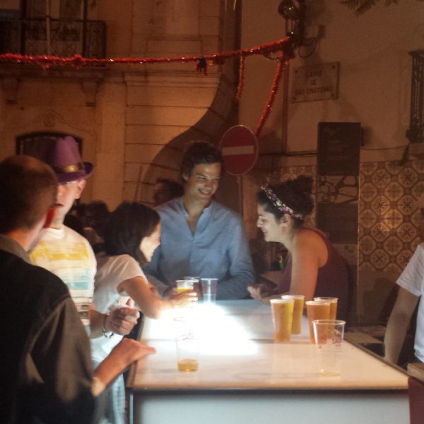 Friends talking during St. Anthony in Lisbon