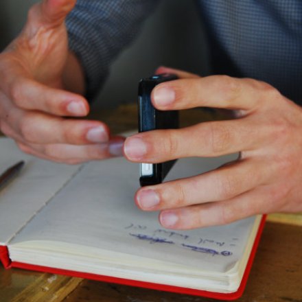 Hands holding a phone