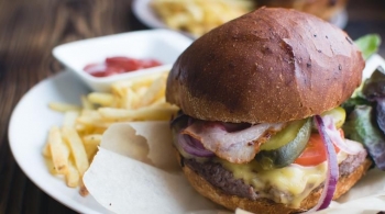 Burger served with fries