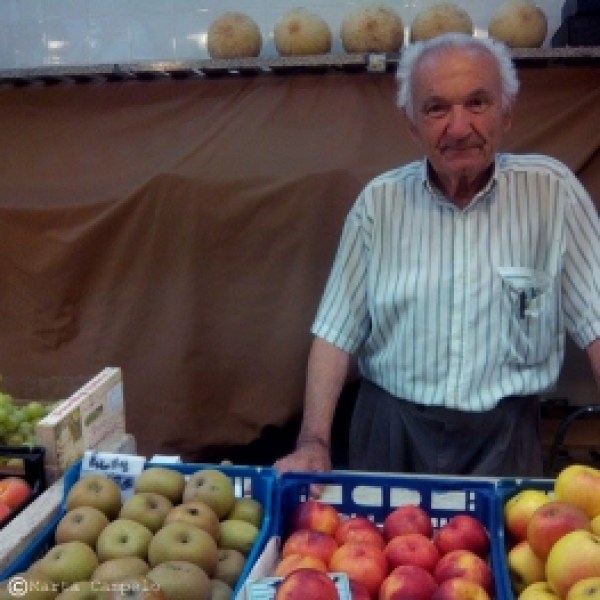 Man selling fresh fruit