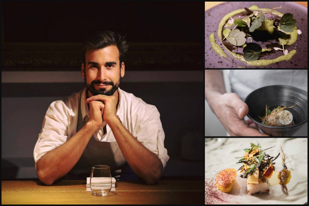 a man sitting at a table eating food