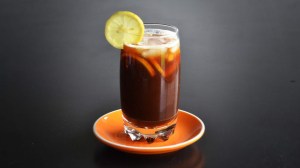 a cup of coffee and a glass of orange juice