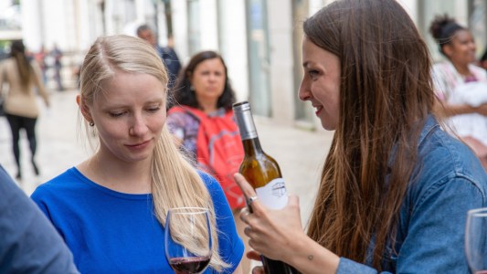 a woman holding a wine glass