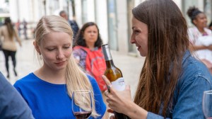a woman holding a wine glass