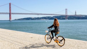 a bicycle next to a body of water