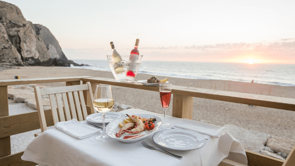 00.Colares travel guide for food lovers_feat photo a pizza sitting on top of a beach