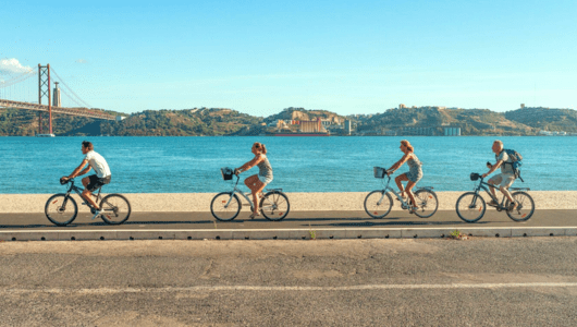 a bicycle next to a body of water