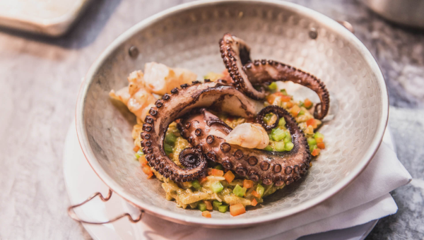 00.Ericeira travel guide for food lovers_feat photo a bowl of food on a plate