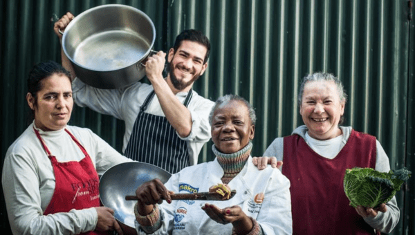 00.Food related social projects in Lisbon_feat photo a group of people smiling for the camera