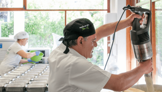 a person standing next to a window