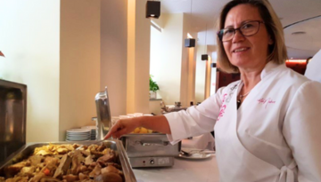 a person preparing food in a kitchen