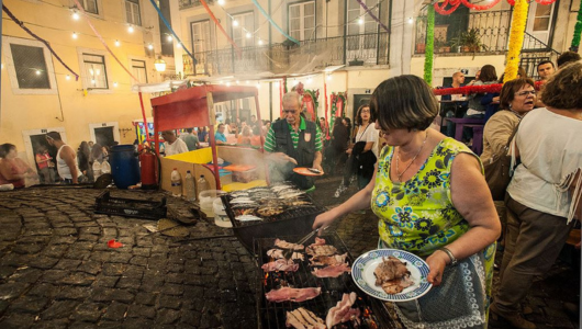 a woman cooking food in a restaurant