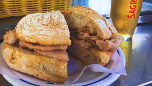 a sandwich cut in half on a plate