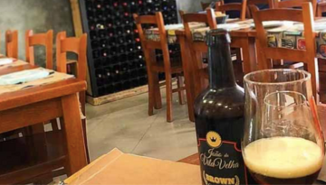 a glass of beer on a table