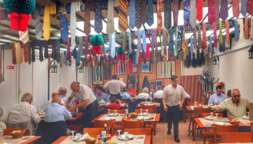 a group of people sitting at a table