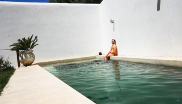 a man in a pool of water