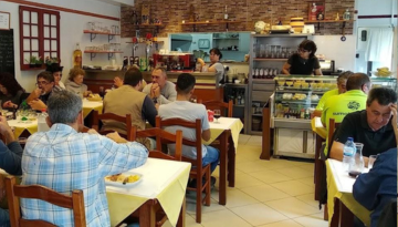 a group of people sitting at a table