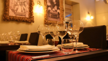 a table with wine glasses