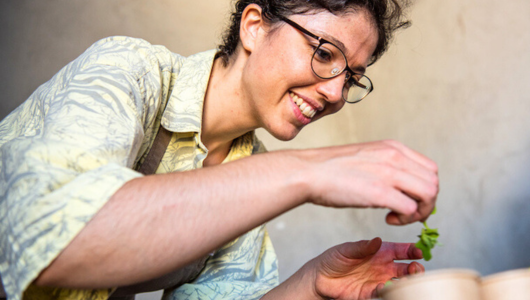 02.Pastry chefs who have made a mark on Lisbon_s culinary scene_chef Ana Raminhos a man is cutting into a bowl