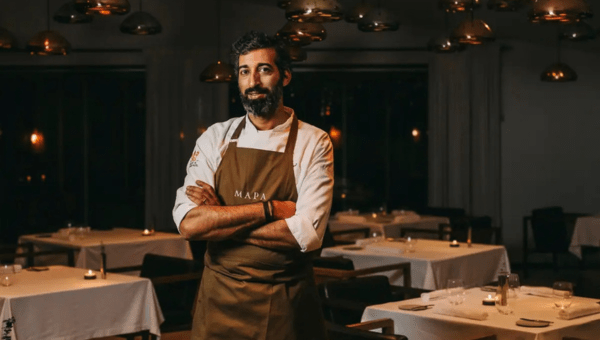 00.Portuguese chefs worth the journey from Lisbon_feat photo a man standing in front of a table