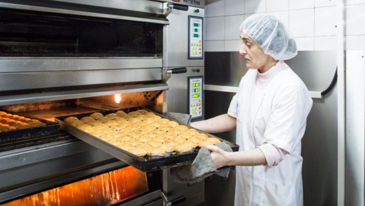 a person preparing food in a kitchen
