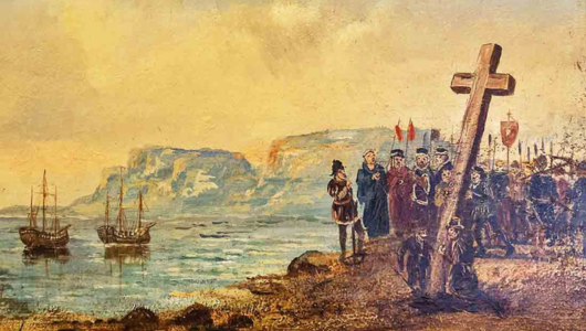 a group of people standing on top of a hill