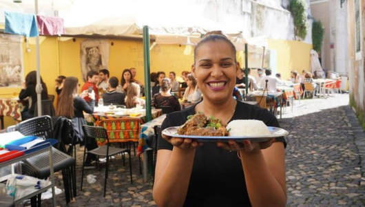 a person sitting at a table in a restaurant