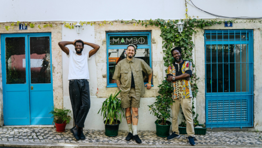 a group of people standing in front of a building