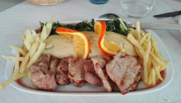 a sandwich and fries on a plate
