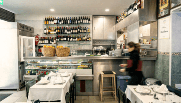 a person standing in a kitchen