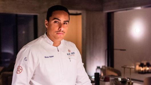 a man standing in a kitchen