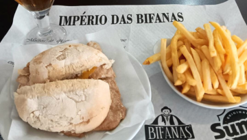a sandwich and fries on a table