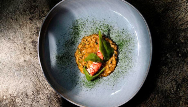 00.The best restaurants in Lisbon to celebrate a special occasion_feat photo a bowl of food on a plate