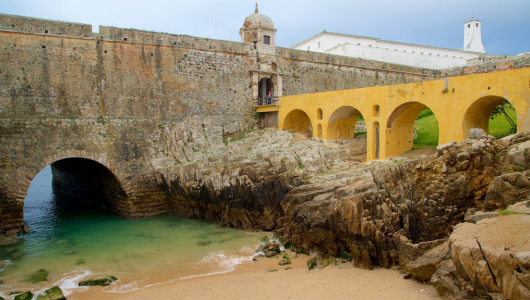 a stone bridge over a body of water