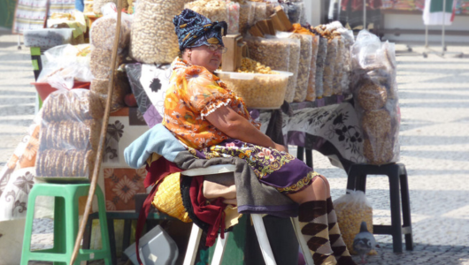 a group of people sitting in a shop