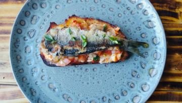 a slice of pizza on a plate