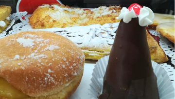 a close up of a doughnut on a plate