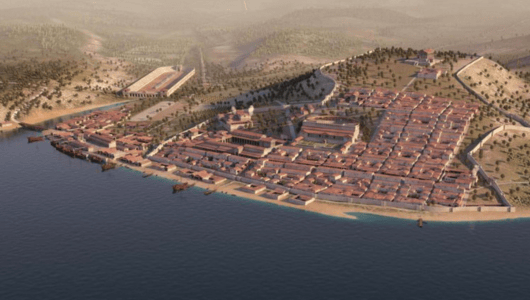 Aerial view of ancient coastal city with buildings and docks.